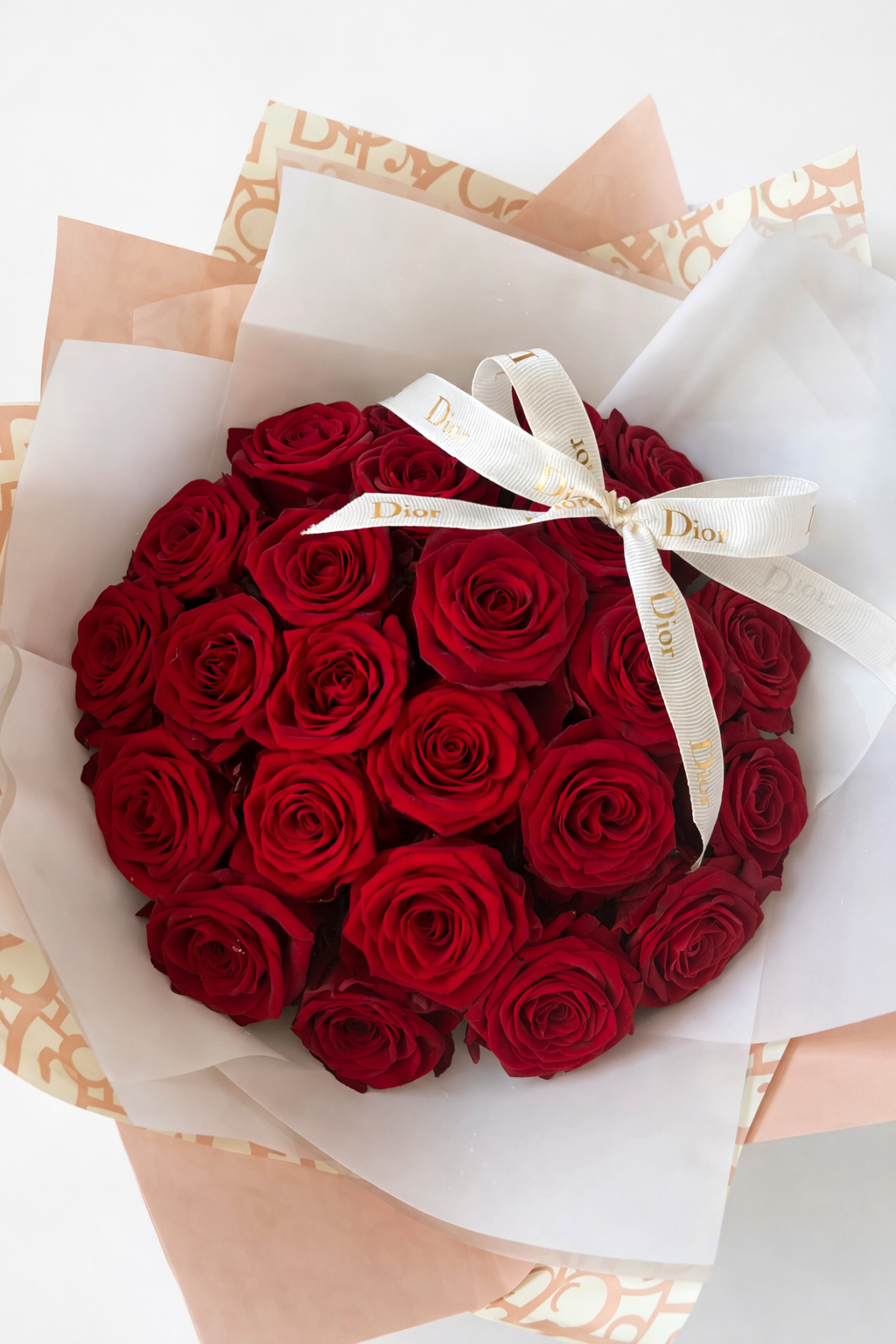 24 rose bouquet in designer inspired nude wrapping
