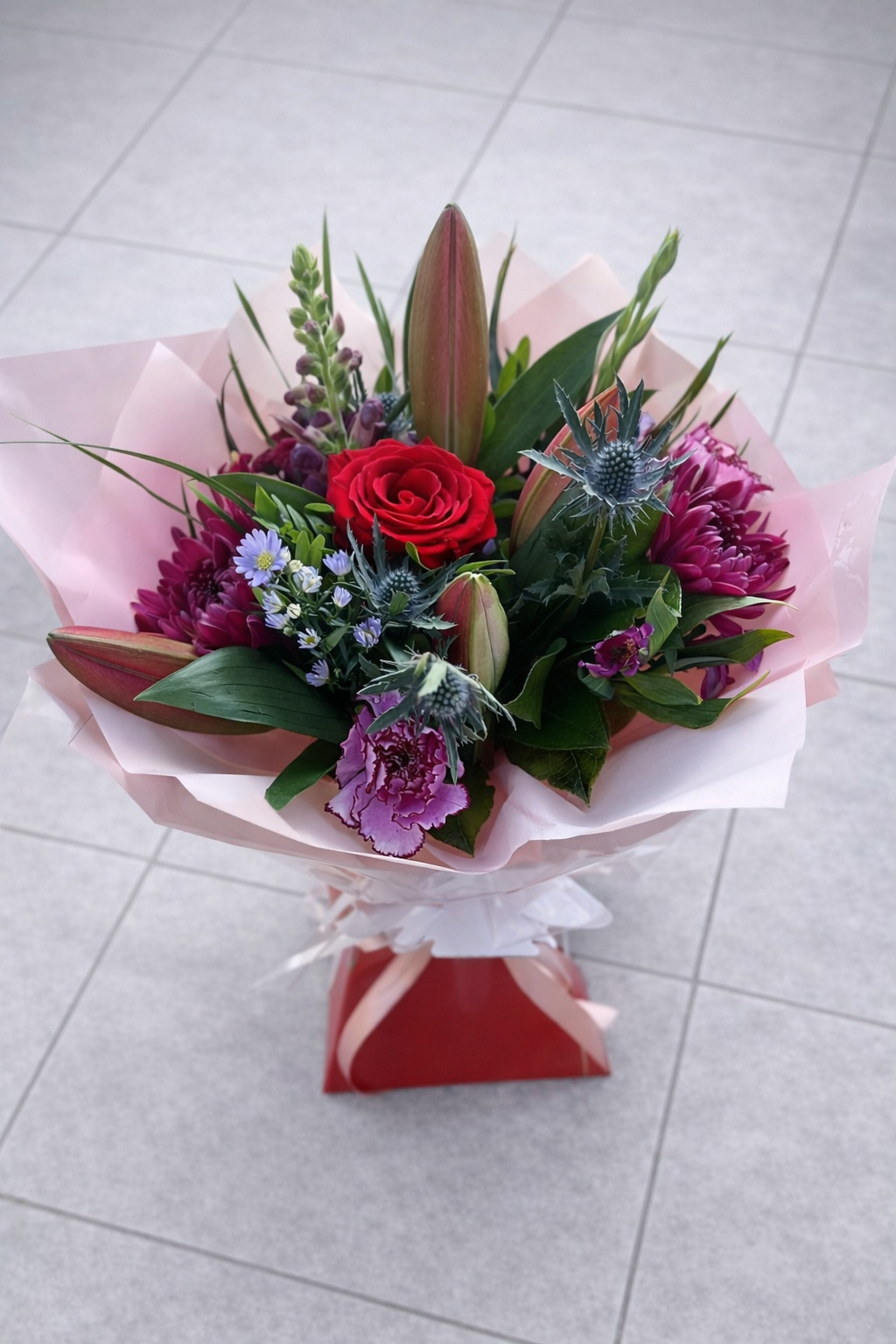 rich tones small florist choice bouquet red purple pink